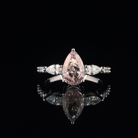 Light Pink Pear Cut Diamond Three Stone Engagement Ring