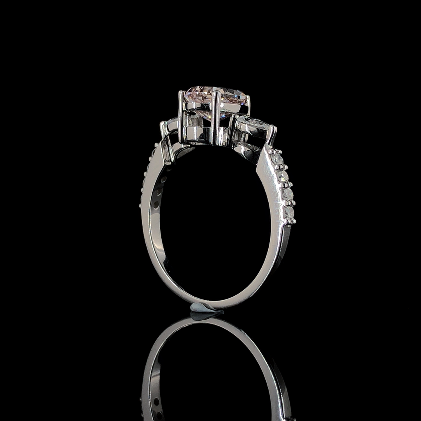 Light Pink Pear Cut Diamond Three Stone Engagement Ring